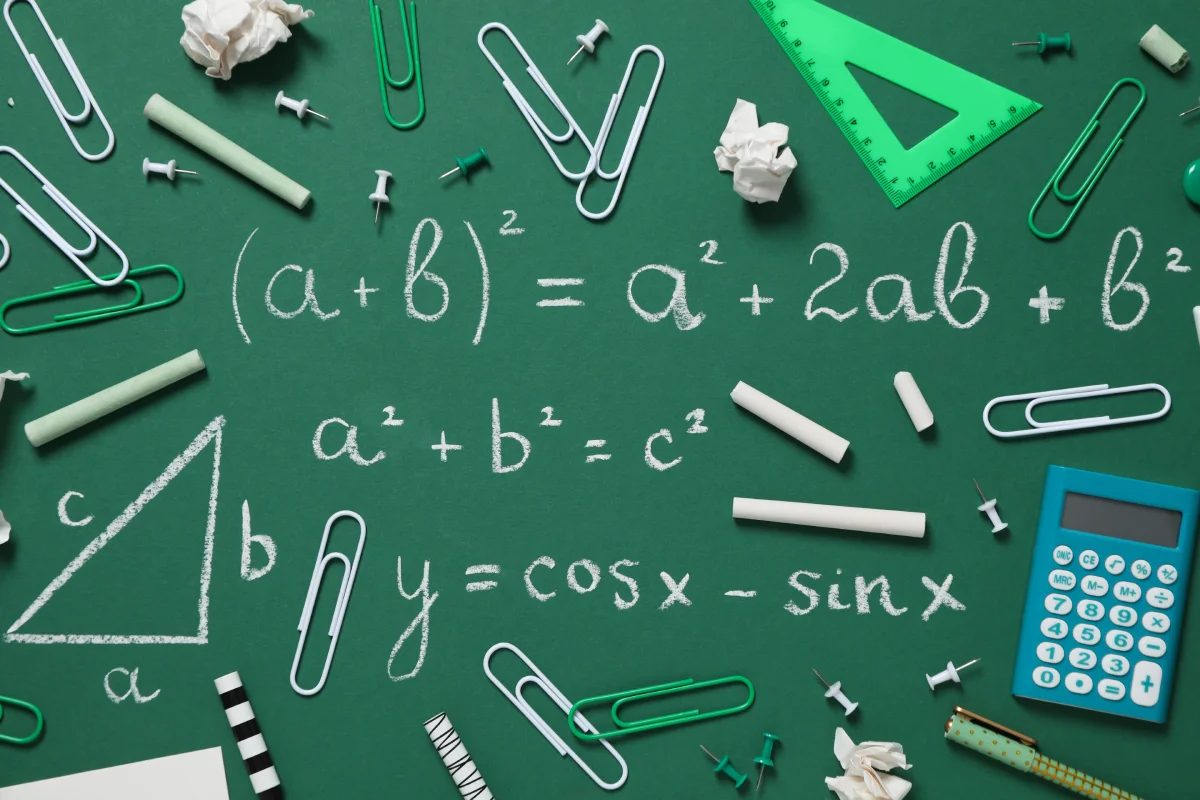 school-supplies-school-board-with-formula-written-chalk