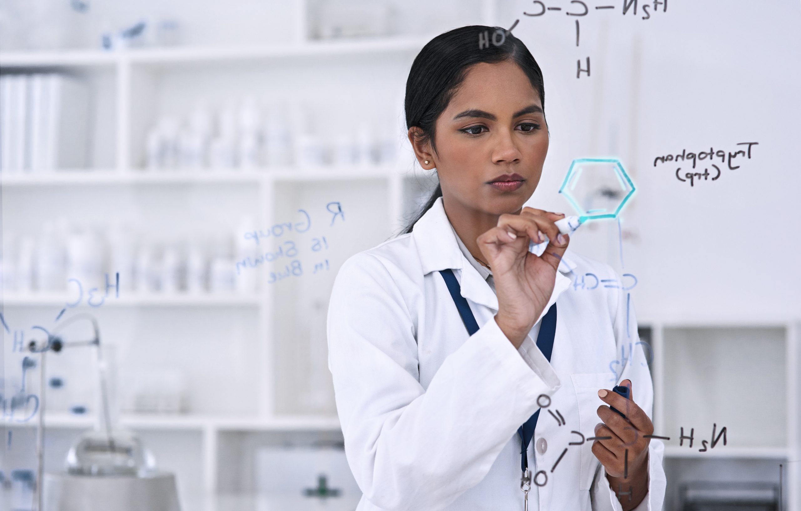 Shes knows these formulas by heart. Cropped shot of an attractiv
