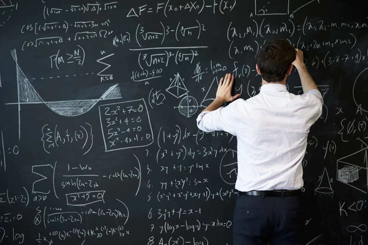 young-man-writing-blackboard